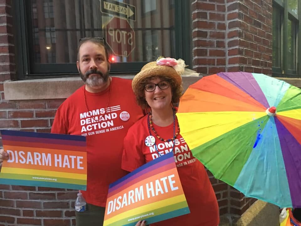 Matt and Deborah in Moms Demand Action shirts at a Disarm Hate rally